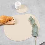 Natural leather placemat and coaster, ivory